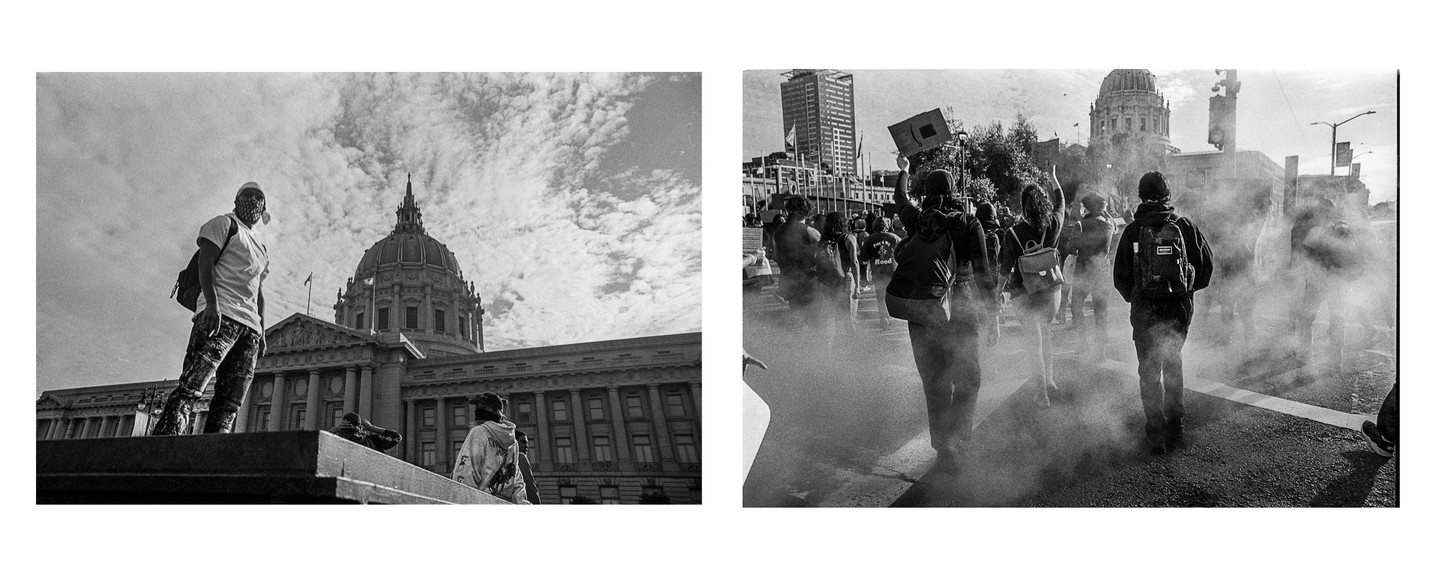 Two black and white images show a man standing on a ledge in front of a domed building and a group of people walking through smoke on a street.