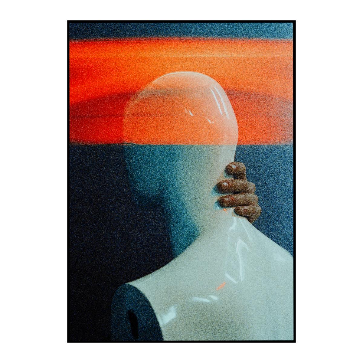 A hand grasps the neck of a mannequin against a background of red and blue light.