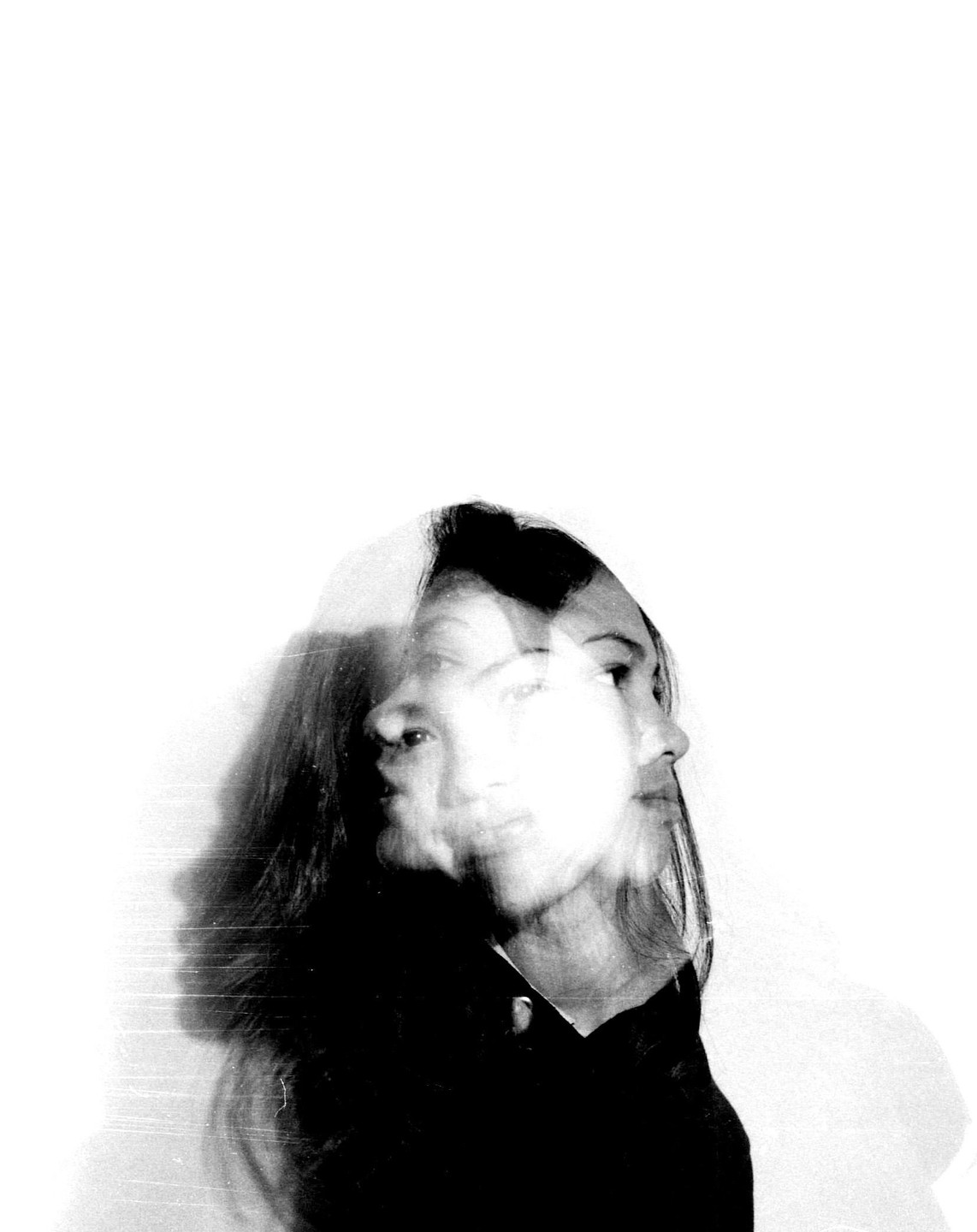 A woman's face is shown in multiple exposures, creating a ghostly effect.