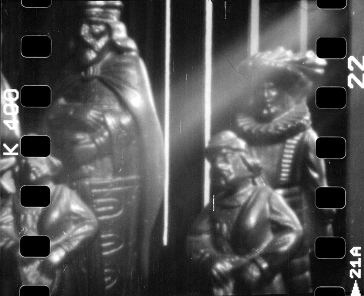 Four chess pieces are visible on a chessboard.