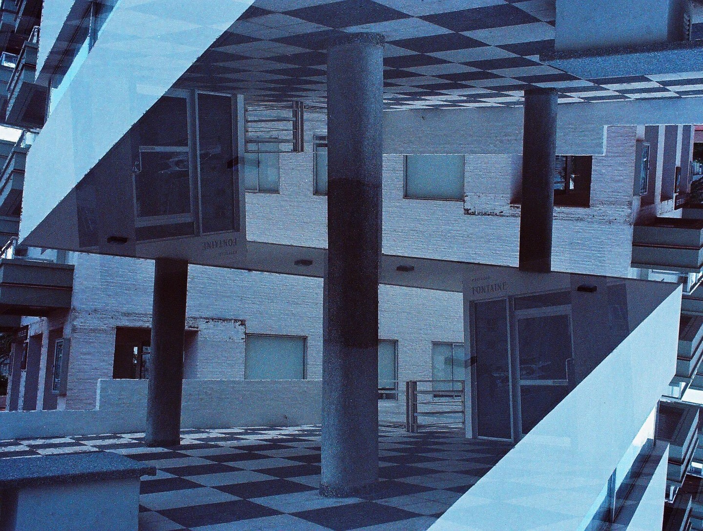 A double exposure shows a building with a checkered floor and ceiling, with the word "Fontaine" visible on a door.
