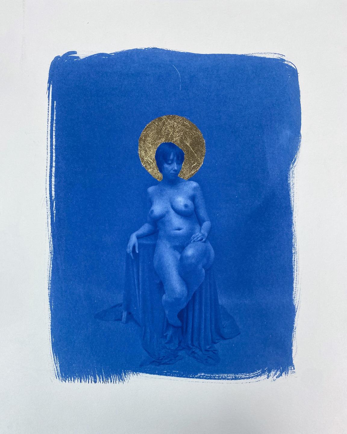 A nude woman sits on a draped stool with a gold leaf halo around her head, all rendered in blue.