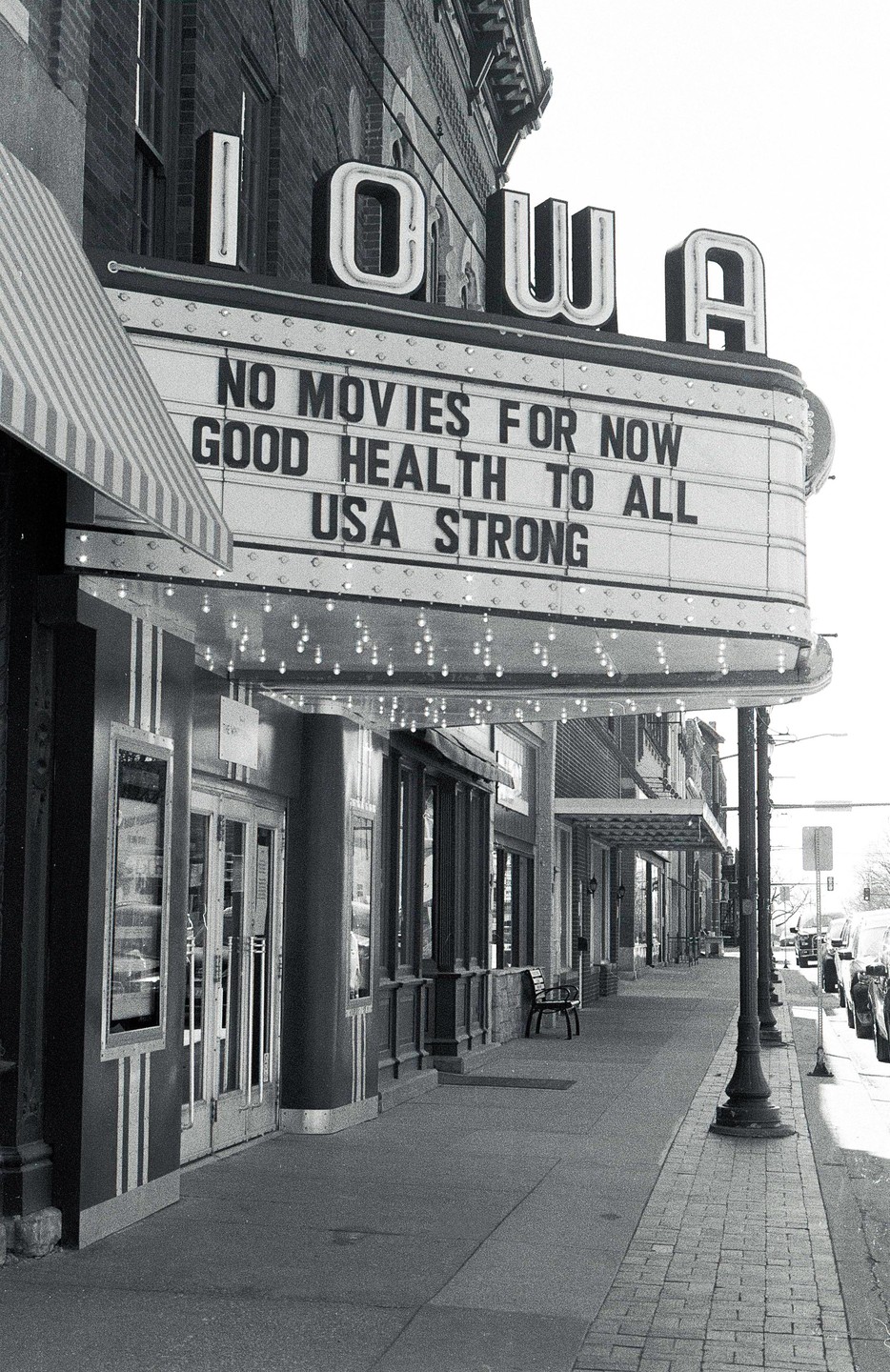 A movie theater marquee in Iowa displays a message about good health and being strong.