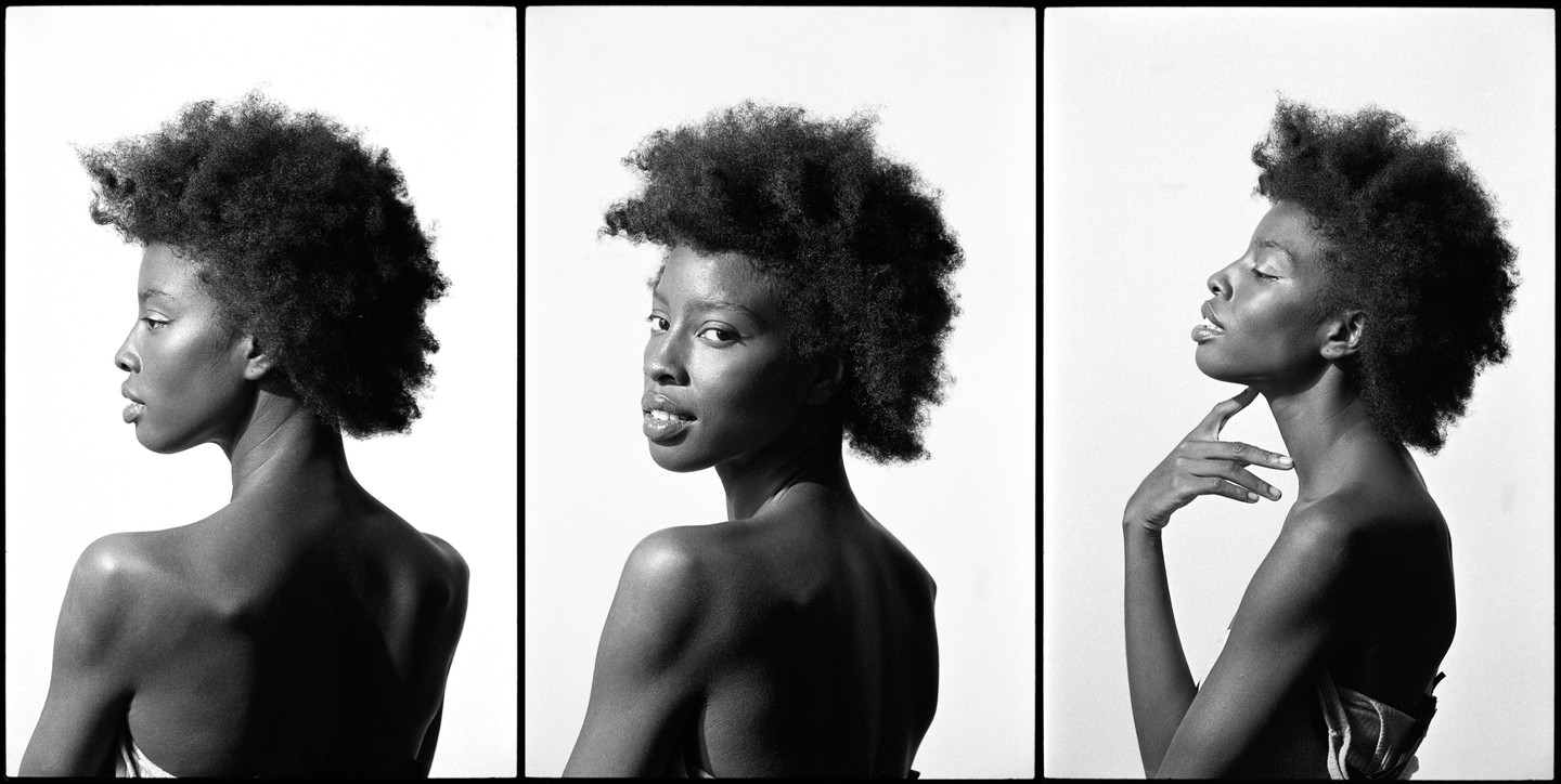 A woman with an afro poses in three different profiles in a triptych.