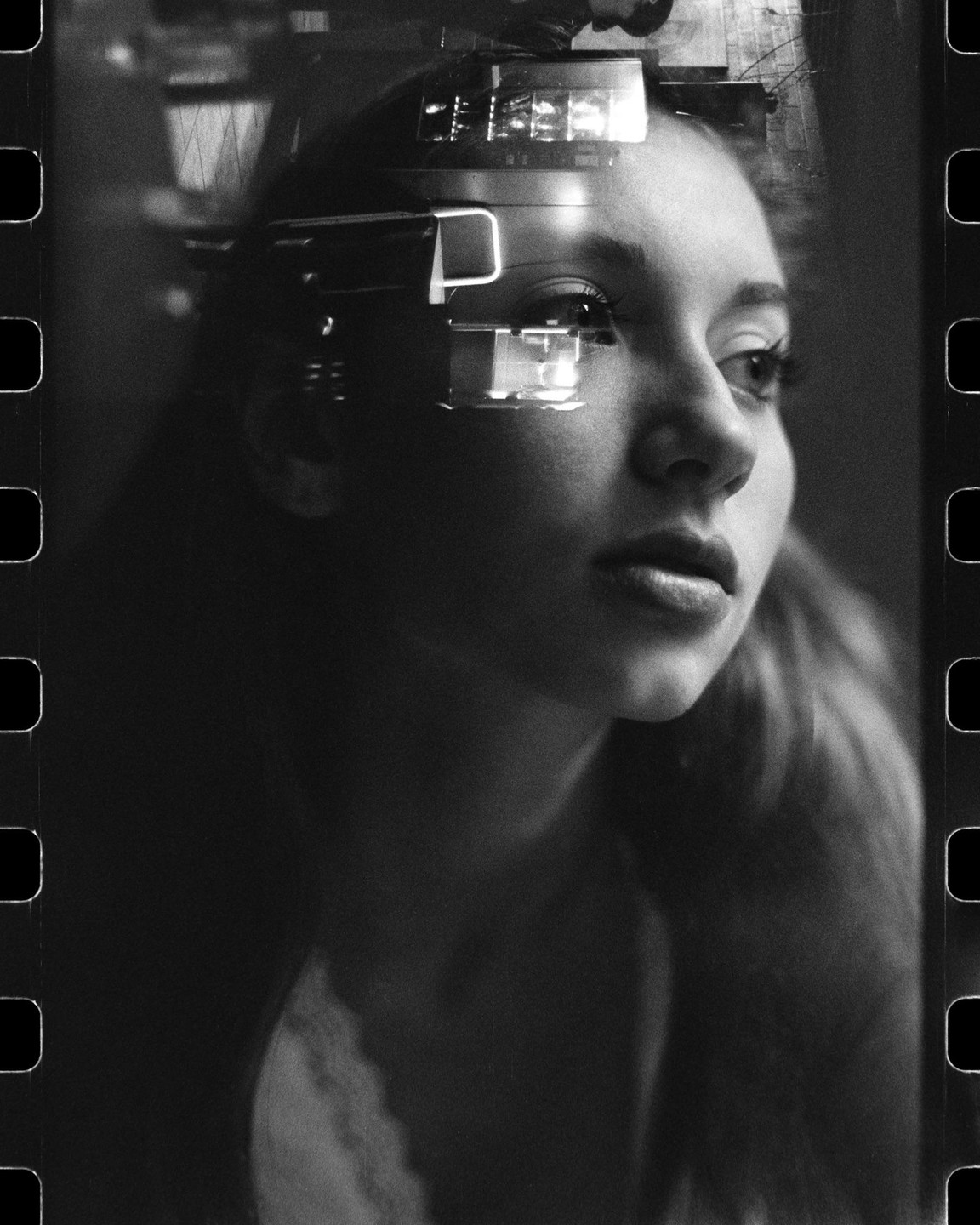 A woman's face is visible in a double exposure with a pool hall.