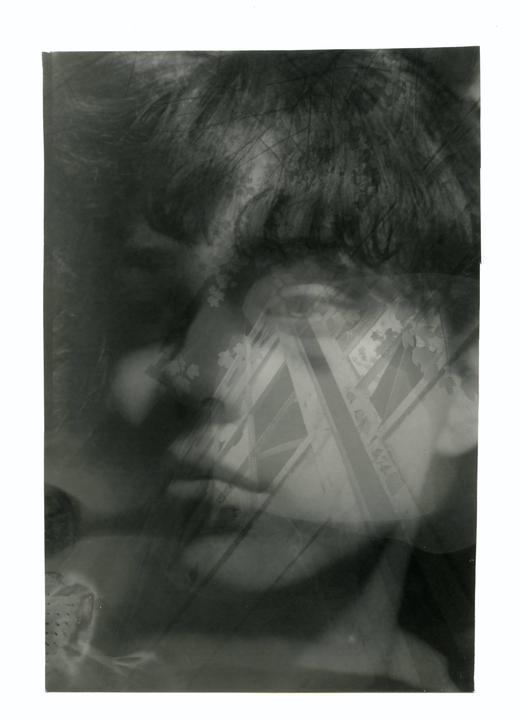 A double exposure shows a woman's face overlaid with a building facade and foliage.