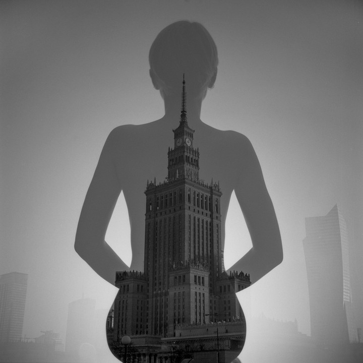 A double exposure shows the silhouette of a woman with a large building visible through her body.
