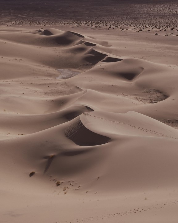 Footprints are visible on the sand dunes of Eureka Dunes.