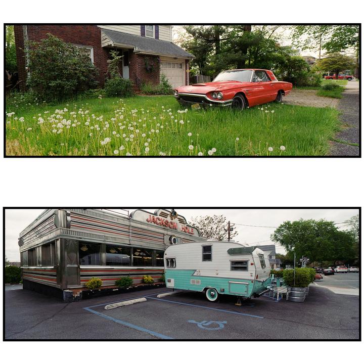 A red car is parked in a grassy yard with dandelions in front of a brick house, and a diner with a trailer is in a parking lot.
