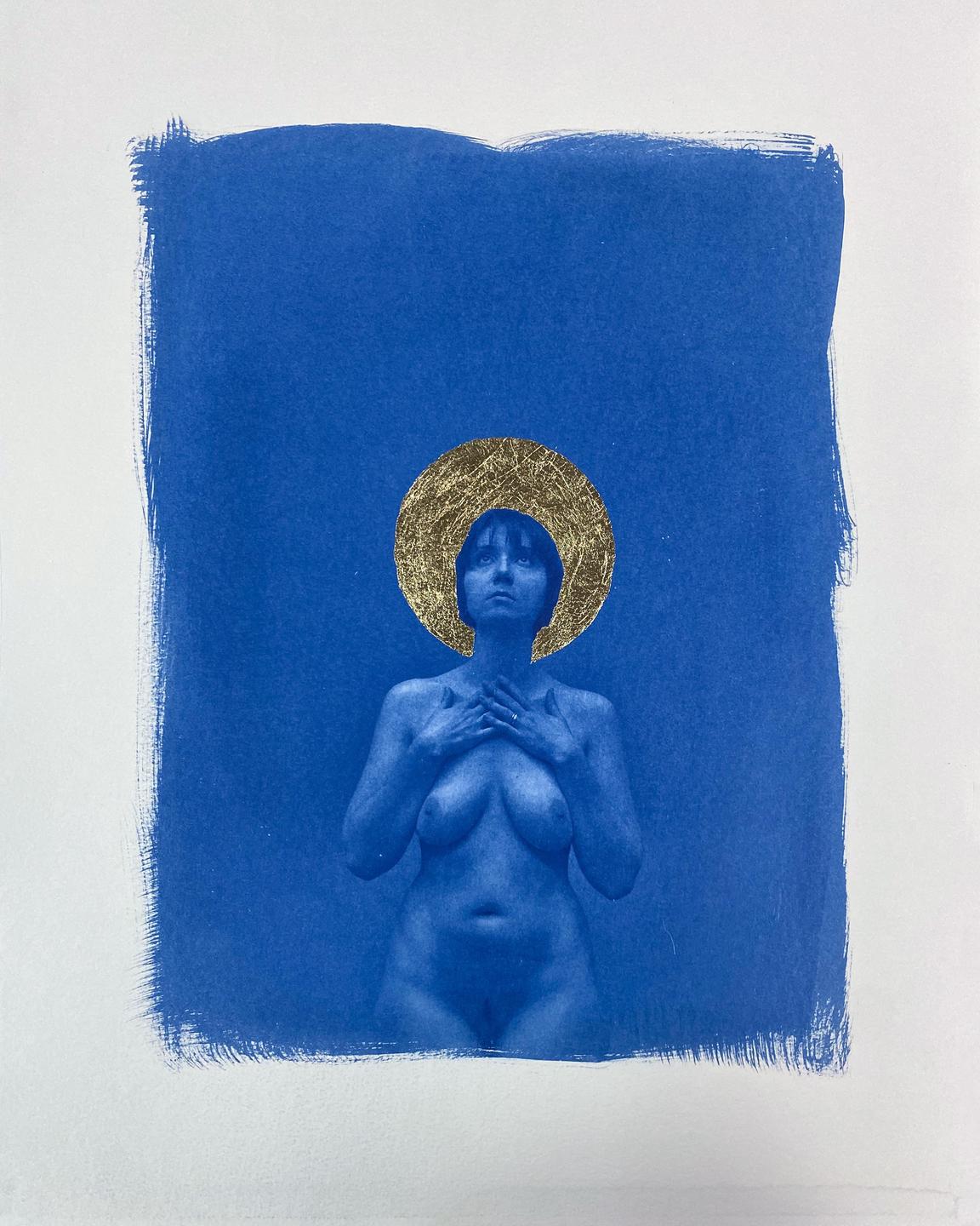 A nude woman with a gold leaf halo stands against a blue background.