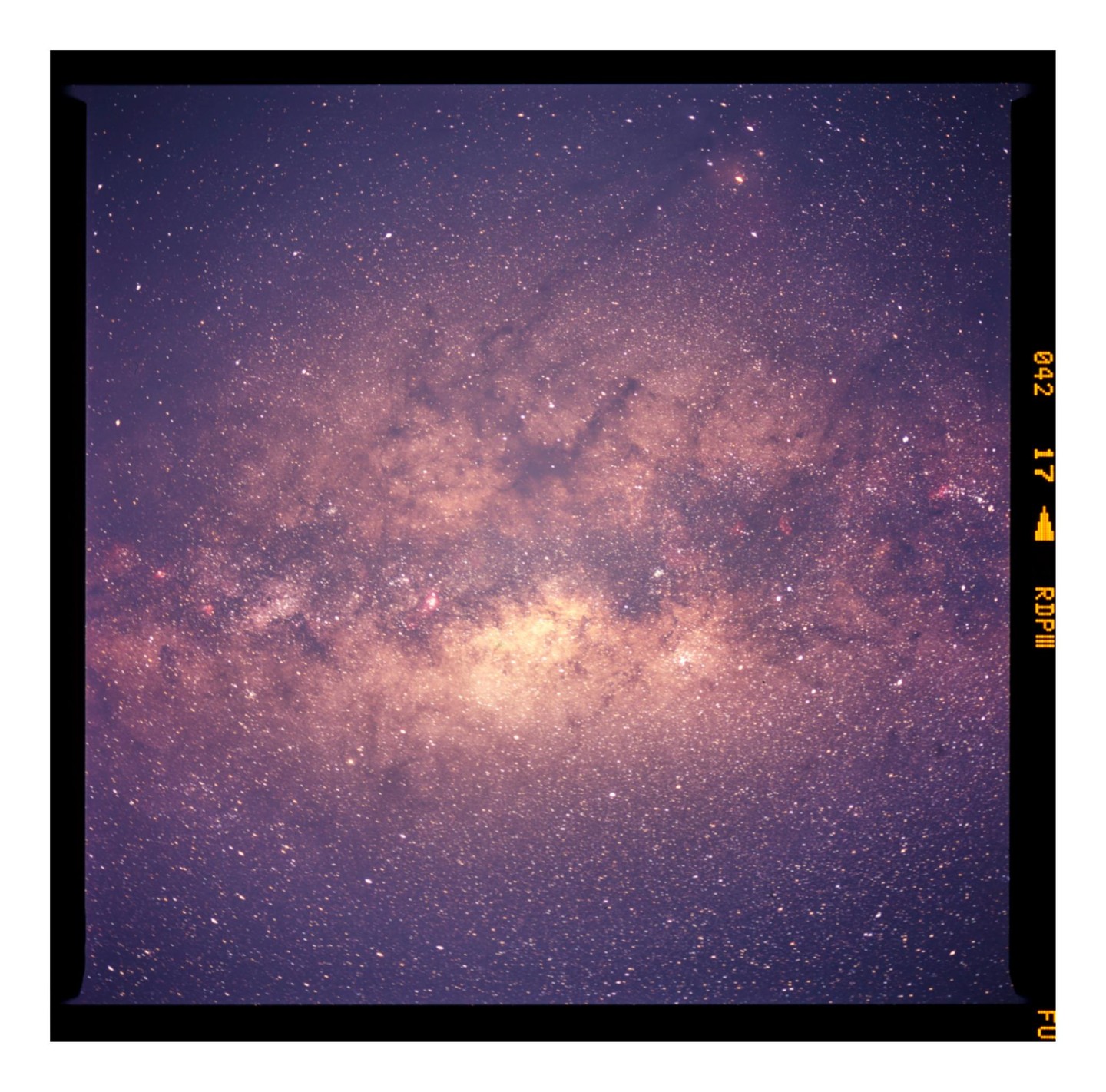 The Milky Way is visible in a night sky full of stars.