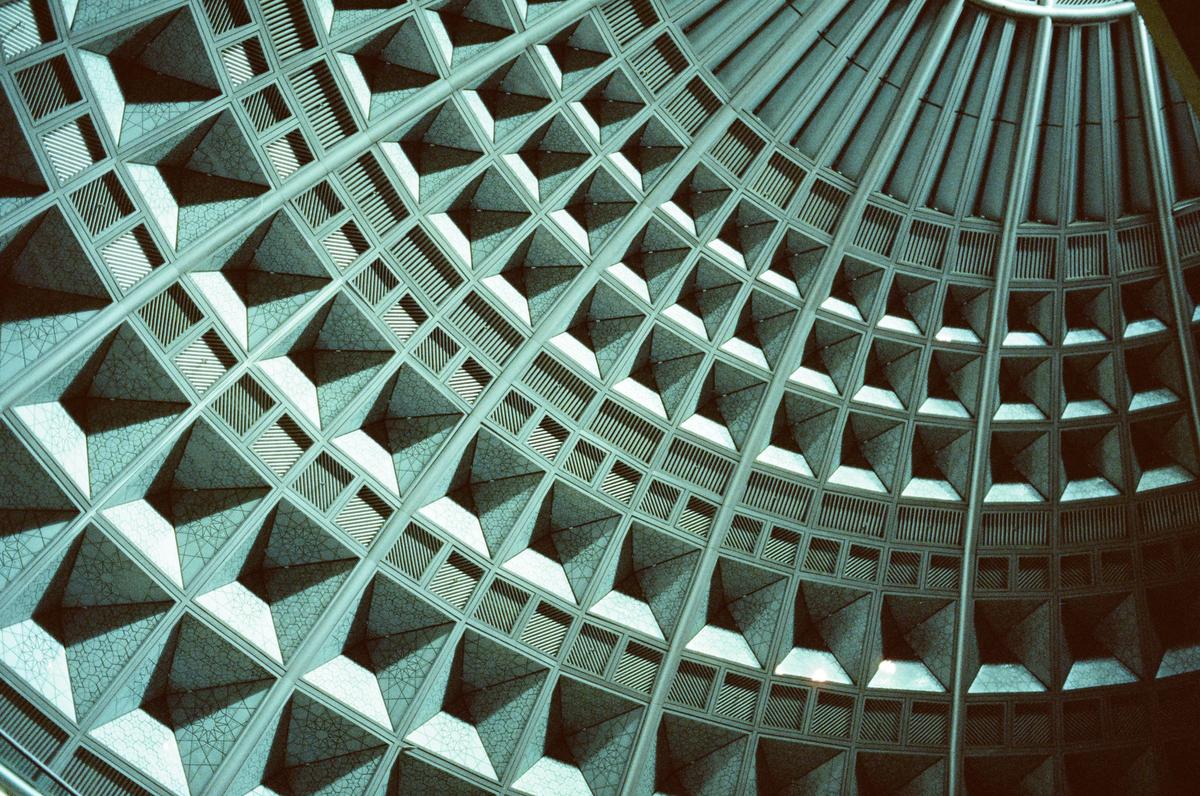 The ceiling of Union Station is made of a grid of square panels, some of which are recessed and some of which are flat.