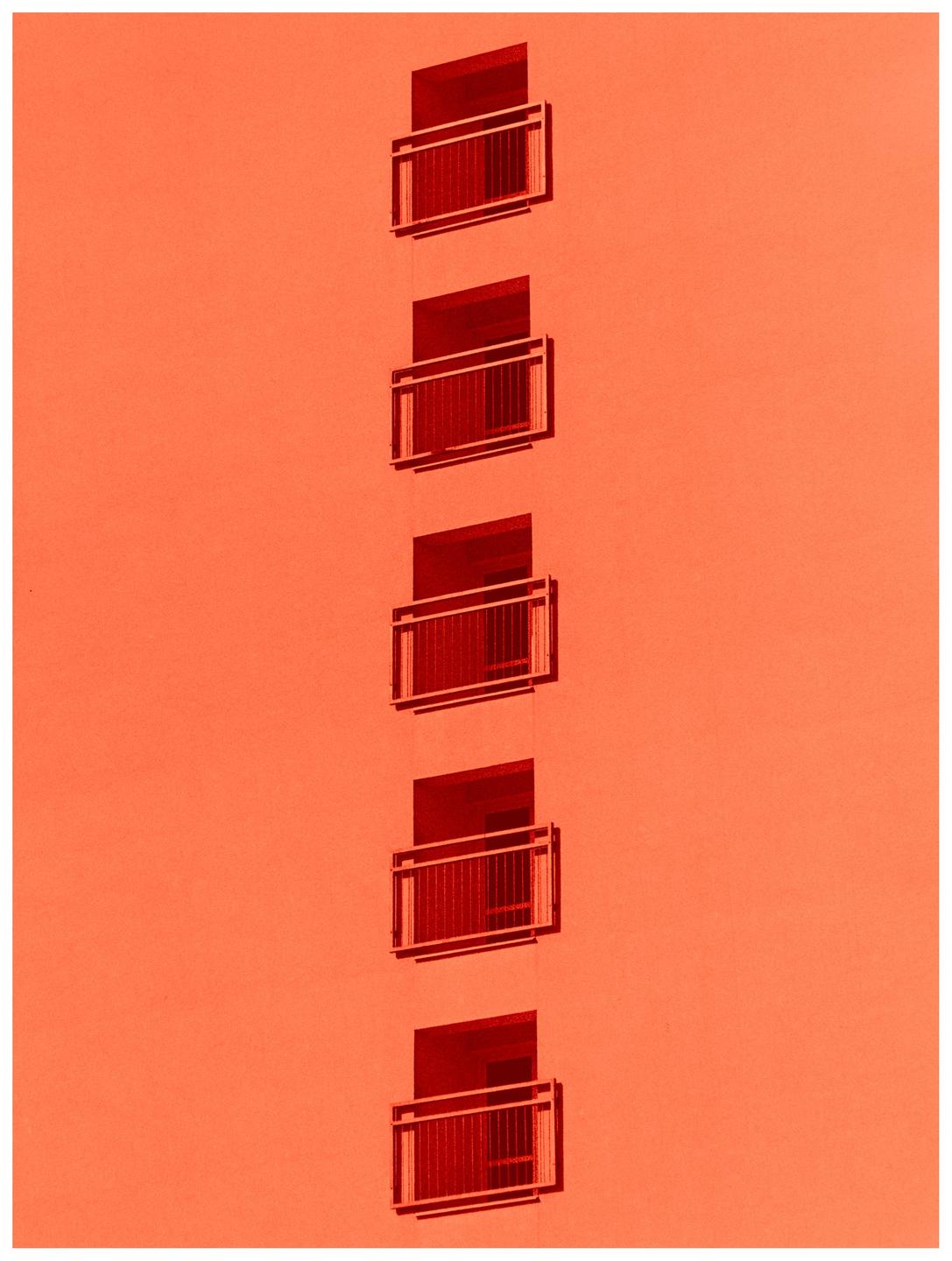 A red building facade with five balconies is shown in a minimalist composition.