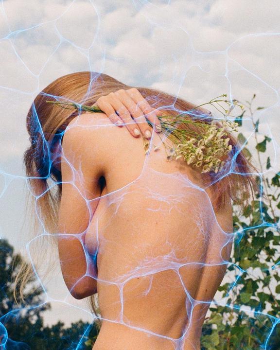 A woman with long hair holds a small bouquet of flowers on her shoulder, with a blue web-like pattern superimposed over the image.