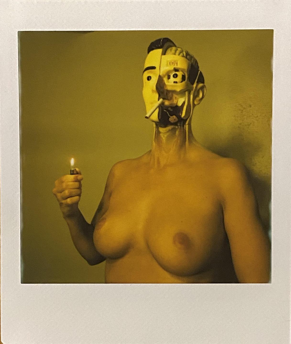 A woman with a partially exposed mechanical face holds a lit lighter.