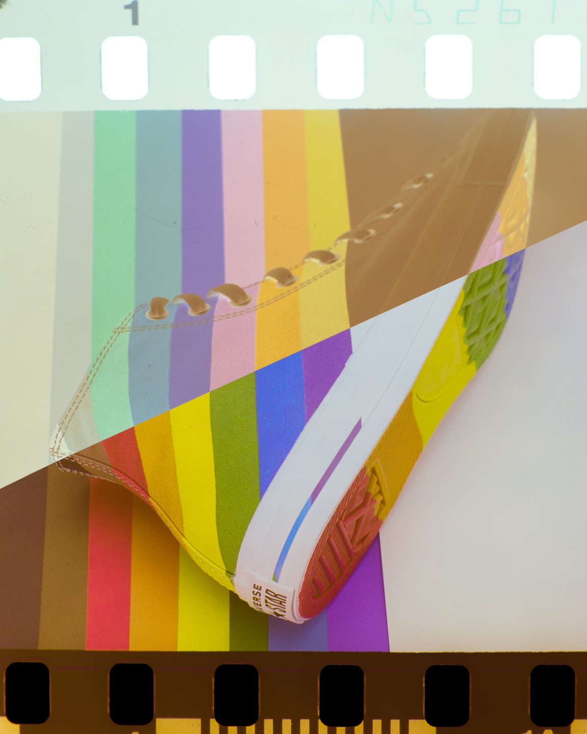 A rainbow-striped shoe is shown against a rainbow-striped background, with the image split diagonally between positive and negative.