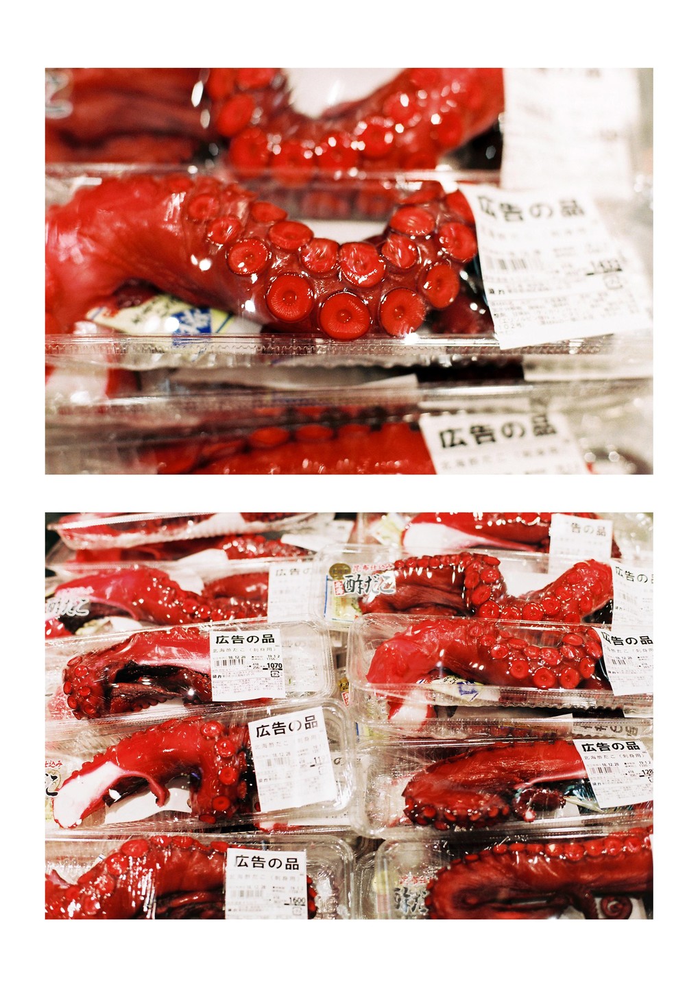 Bright red octopus tentacles are packaged in clear plastic containers with labels in a market.