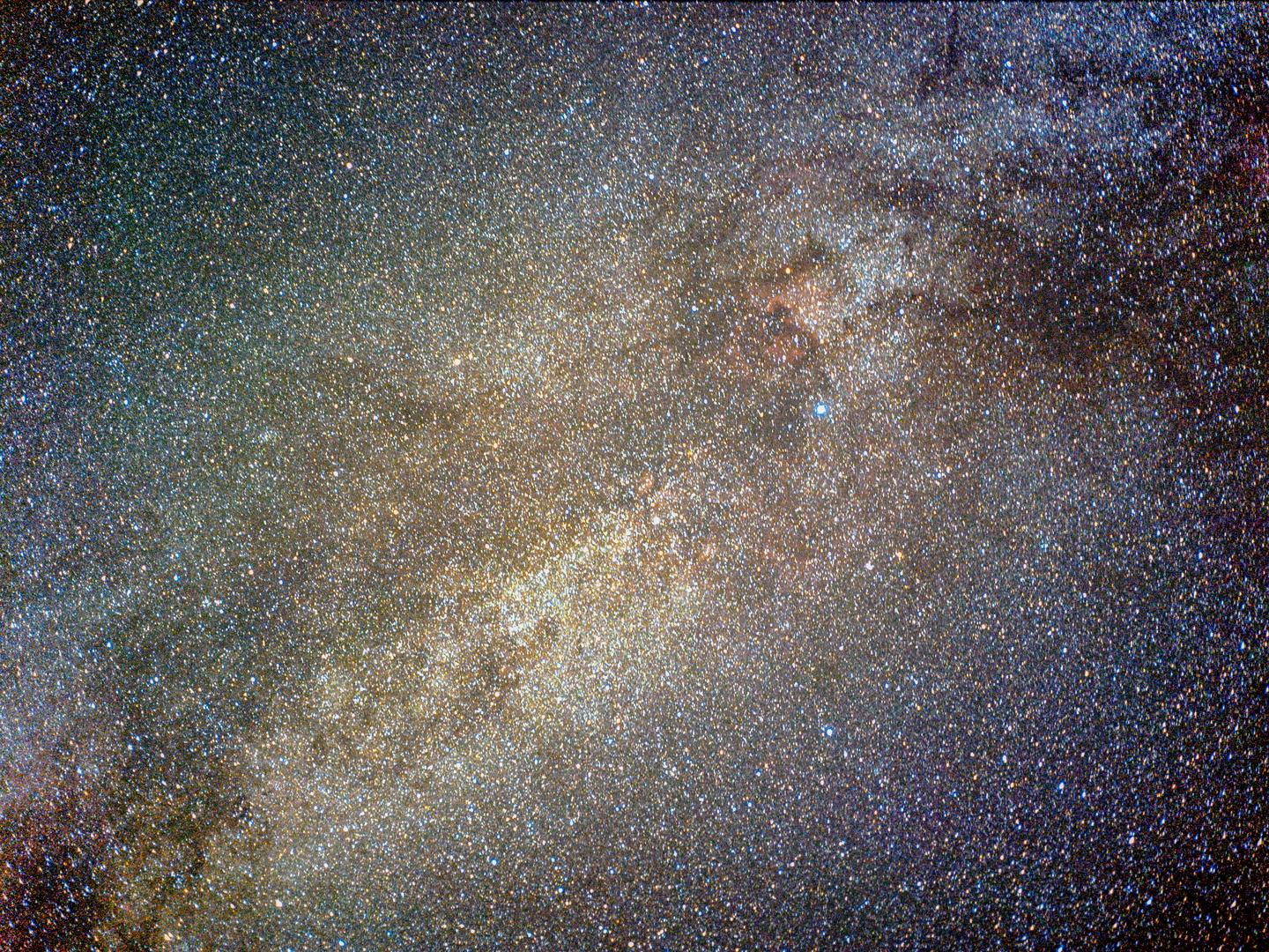 A dense field of stars and cosmic dust forms the Cygnus region of the Milky Way.