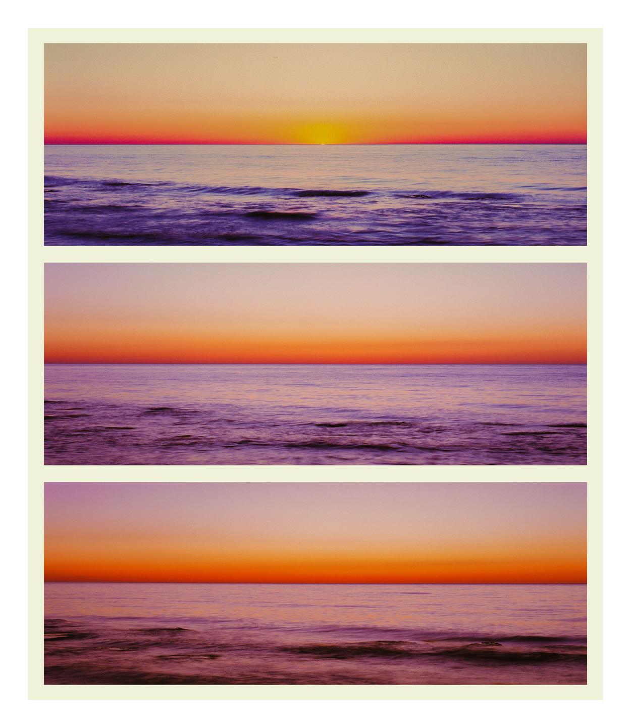 Three long exposure photographs of a sunset over the sea are arranged in a triptych.