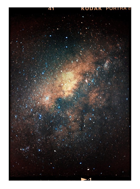 A dense field of stars and cosmic dust forms the Milky Way galaxy.