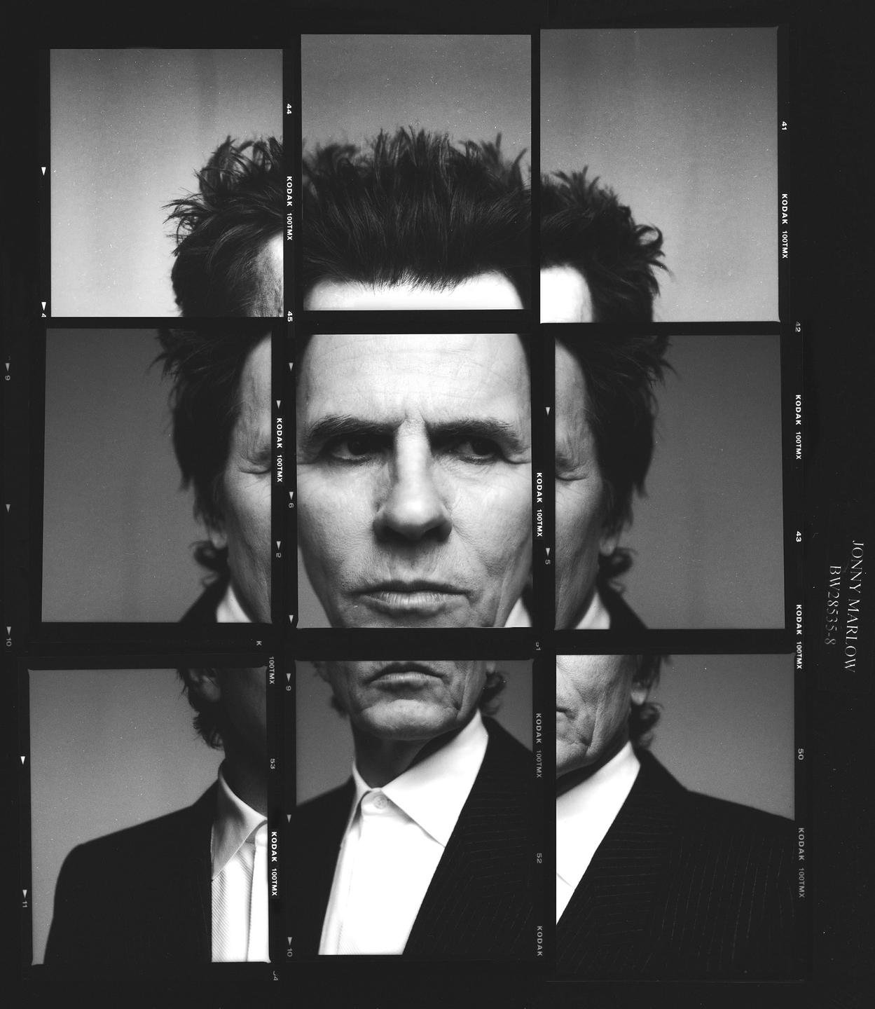 A man's face and upper body are shown in a grid of black and white contact prints.