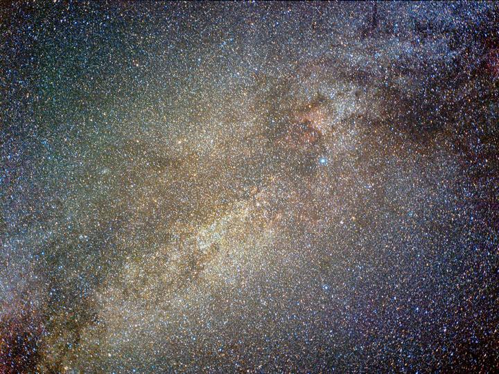 A dense field of stars and cosmic dust forms the Cygnus region of the Milky Way.