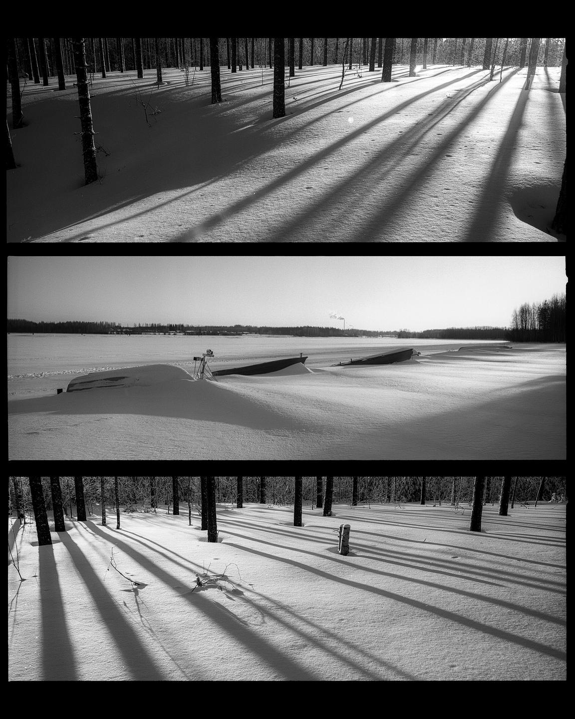 Three black and white horizontal panels show a snowy forest with long shadows and boats covered in snow on a frozen lake.