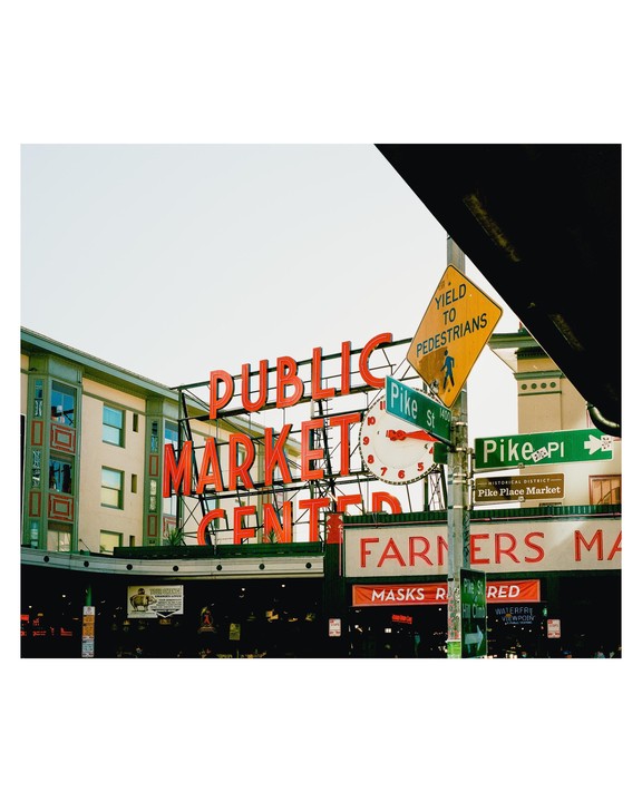 The Public Market Center sign is visible above the entrance to the Pike Place Market.