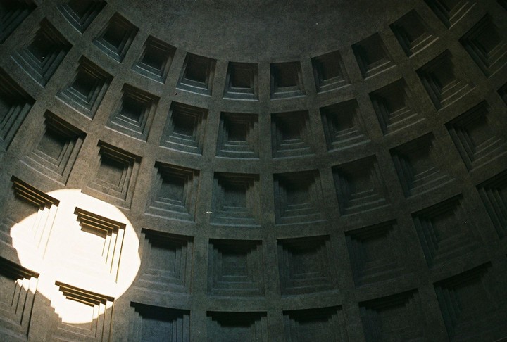 The coffered dome of the Pantheon is illuminated by a circular oculus.