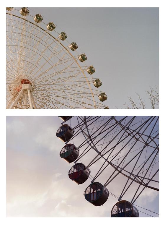 A ferris wheel with many gondolas is shown against a cloudy sky in two different exposures.