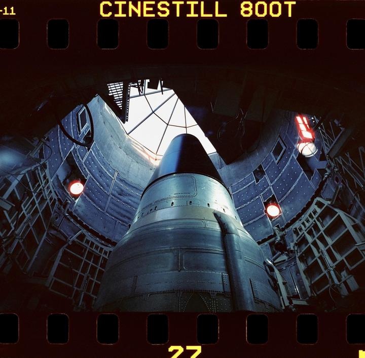 A large missile is visible inside a silo with a skylight above it.