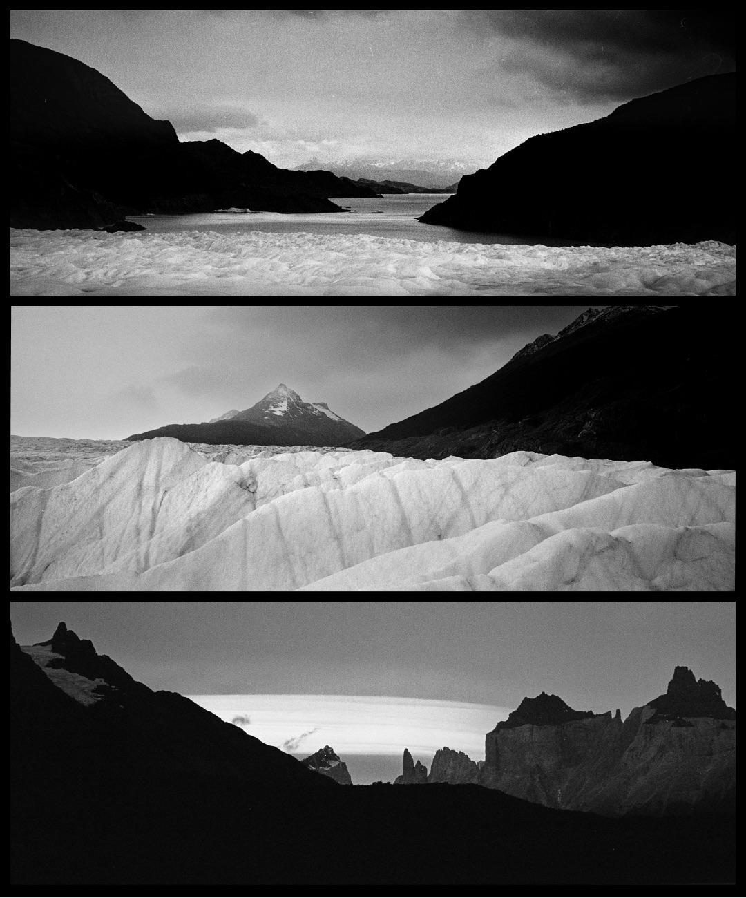 Three panoramic black and white images show a glacier, mountains, and a body of water.