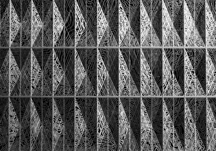 A pattern of triangles with wavy lines is visible.