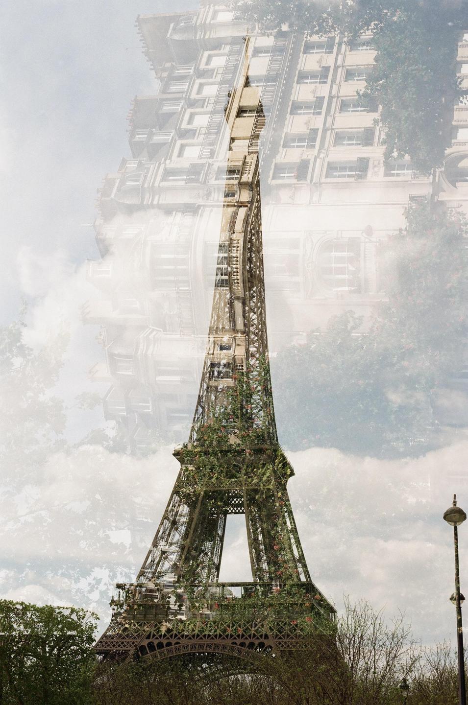 A double exposure shows the Eiffel Tower covered in foliage superimposed over a building facade.