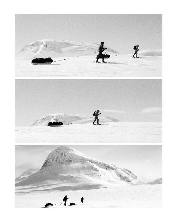Three black and white images show people skiing across a snowy landscape while pulling sleds.